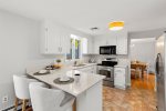 Eat in kitchen brimming with amenities